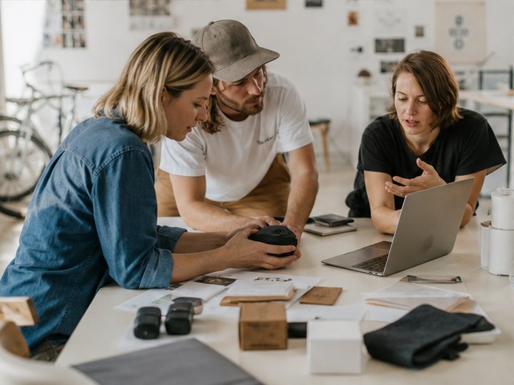 Overseas crowdfunding team checking prototype products and reward bundles